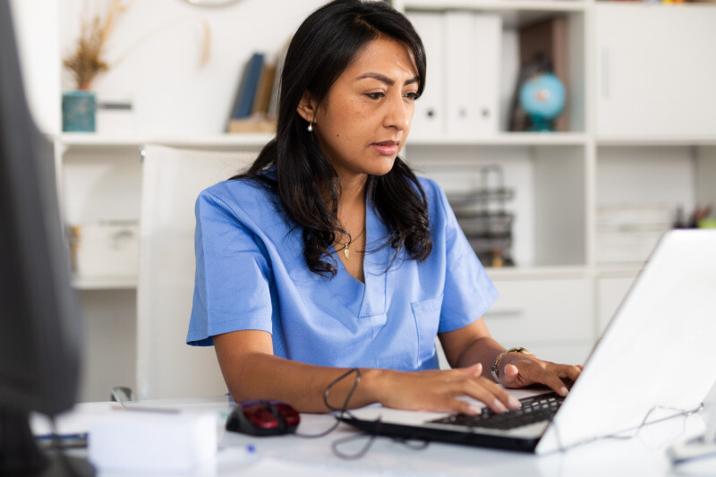 lgi-workforce-pro-employee-self-services-female-nurse-serious-laptop-module-3