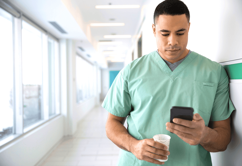 lgi-nurse-male-phone-schedule-shift-swap