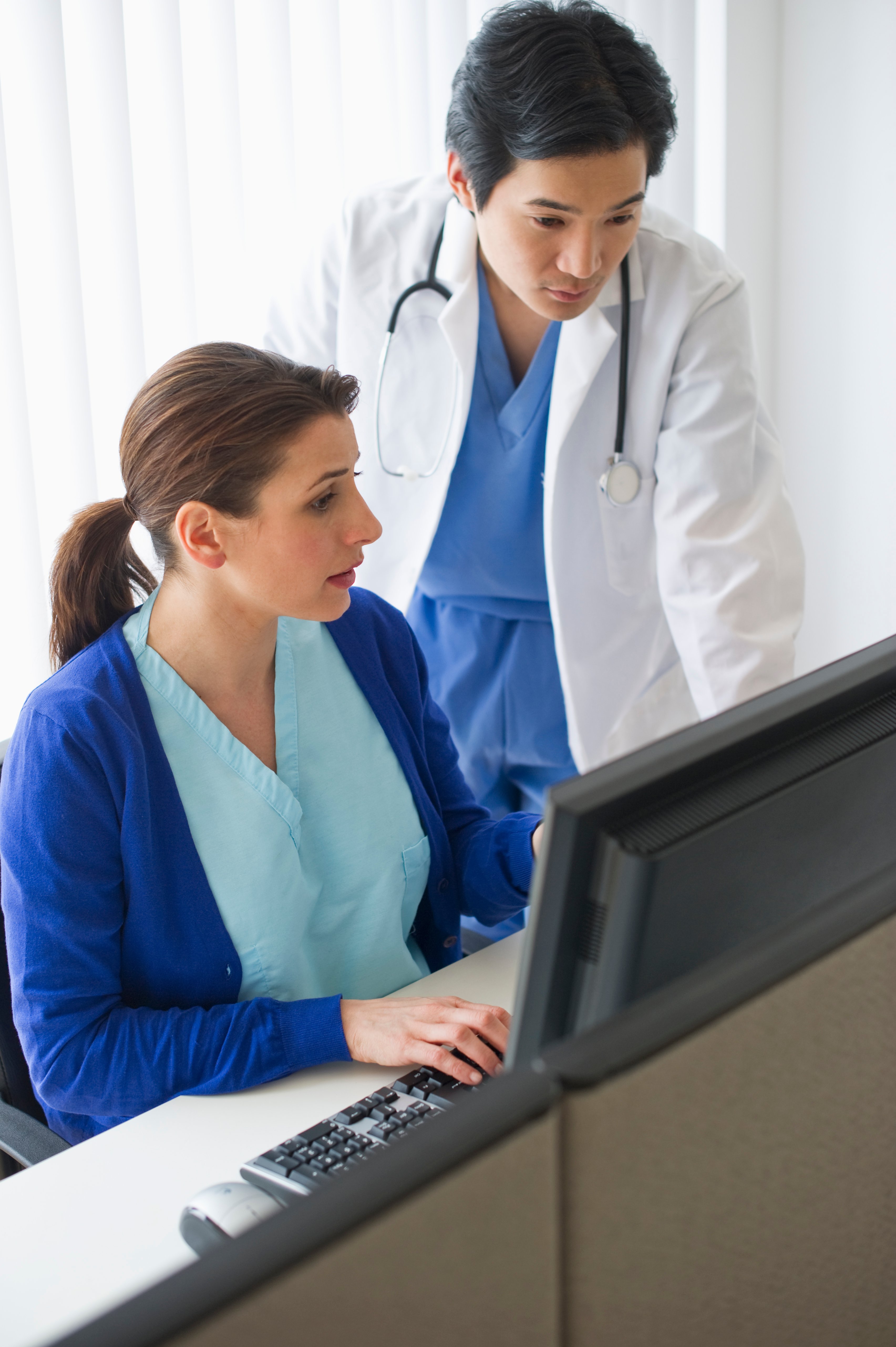 Physicians working laptop